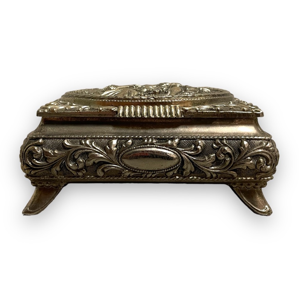 Intricate Silver Jewelry Box With Red Velvet Lining
